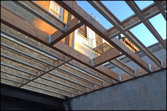 The roof framing was flushed-framed similarly to the addition’s parlor-level floor, but with TJIs and an LVL box-out for a skylight. 
