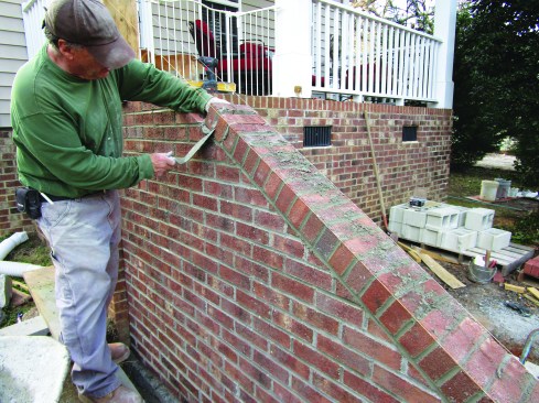 Then he set up two lines for laying the rowlocks.