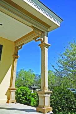 At the fascia, Boral crown molding and dentil trim from Duration covered a raised perimeter curb needed for roof drainage. Elsewhere on the home, new window sills and highly decorative trim for box gutters were also made from milled Boral.