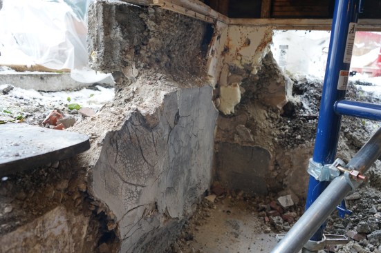 The foundation walls in this corner of the building were in terrible shape and fell apart easily with an impact hammer. 