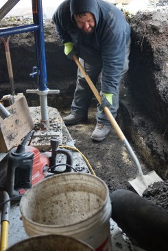 The crew dug trenches 12 inches deep and 24 inches wide for the footings, removing all the excess soil and debris in five-gallon buckets. 