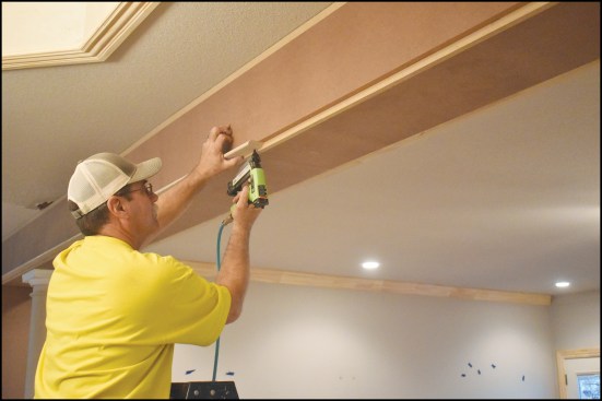 A number of different elements were used to trim out the false beam, starting with another wide MDF band applied to the sides of the beam, followed by a 1/2-inch-by-2-inch bead (above)…
