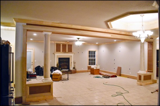 The classic room divider helps define the transition between the entry foyer and the living room.