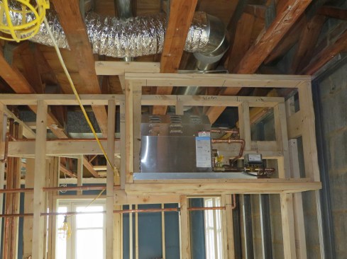 A steam generator is housed in a spacious, roughed-in soffit, providing easy access to maintain the unit.