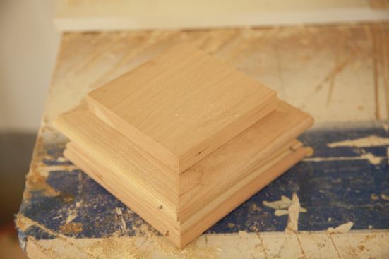 The cover, fashioned from a scrap of cherry, has a rabetted edge that ensures a tight fit with the interior of the cap. 