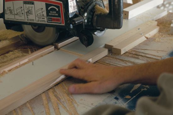 For the second pass, a spacer moved the workpiece out and against the second stop to locate the right edge. (Also shown in photo 11.)