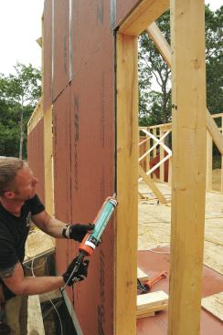 Acoustical sealant that never hardens goes in every joint and along every stud. Special tape then covers the joints.