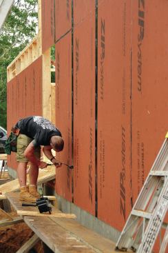 Rolling creates a permanent bond between the tape and the sheathing.