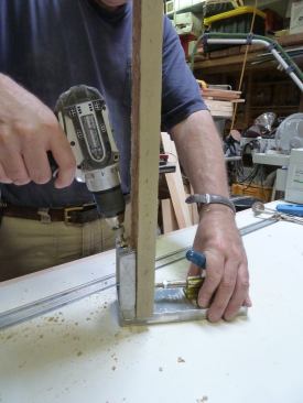 Place screws at a 15-degree angle using a Kreg jig and a specialized stepped drill bit with a stop collar. 