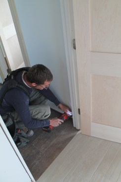 When the jamb is secured, go back and cut the shims with a utility knife or a multi-tool.