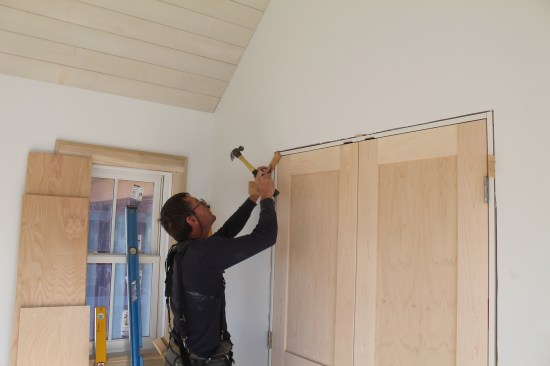 To make the doors hang in exactly the same plane, lightly tap the corners in or out until satisfied with the alignment.