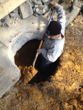 The author dug down for the footing but hit water three-quarters of the way down. The rest had do be dug working in conjunction with a pump.