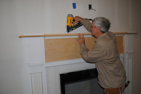 Then it’s attached to the mantel below.