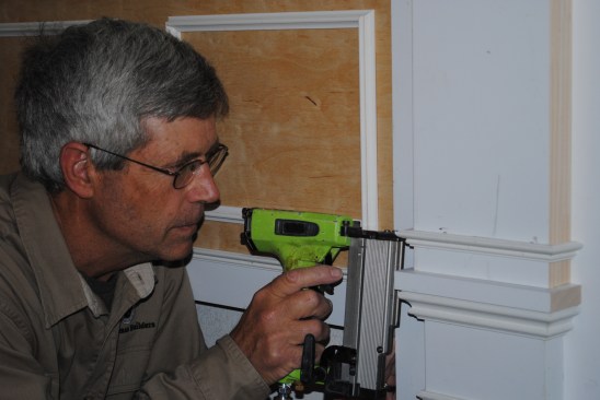 At the pilasters, a horizontal bead of molding gives the panel a better proportion.