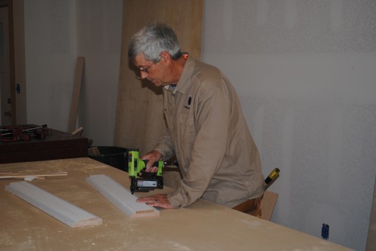 To simulate fluting, the author mounts reeded molding to 1-by boards.