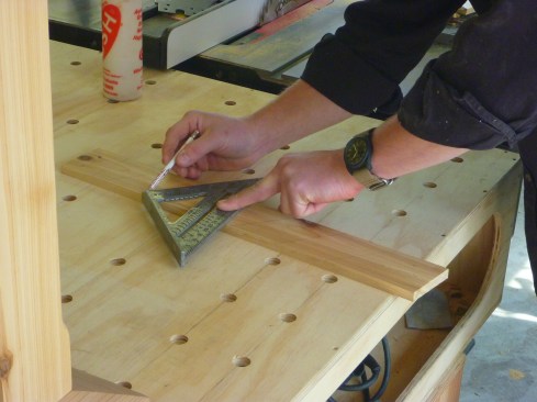 Author lays out louver jambs, spacing the louvers evenly from top to bottom, and marking them at a 35° angle, leaving enough room at the top for an acrhed frieze.
