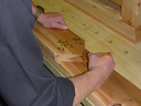 Next the author traces and cuts the rest of the the rafters using the pattern rafter.