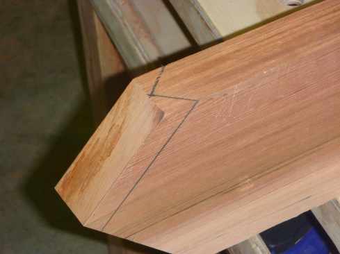 The plumb cuts on the bottom ends of the rafters receives a 45° cut in both directions to provide a nailing surface for the facia.