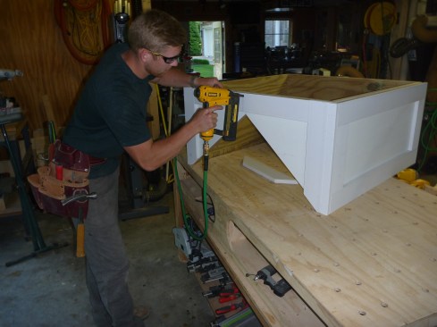 To give the base a paneled look, 1x stock attaches to the sides . 
