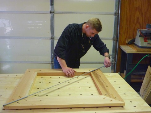 Diagonal measurements confirm that the frames are perfectly square.
