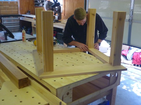 Corner posts sit on layout lines on the frame.