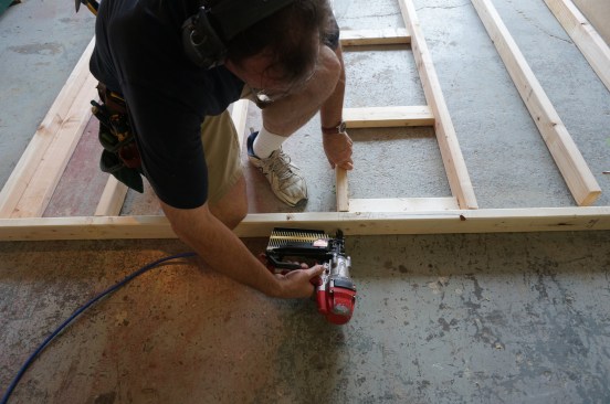 Drive nails through the plates and into ends of the studs.