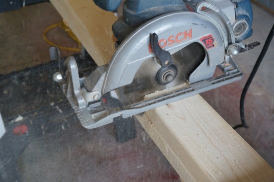 Keeping the plates stacked cut through the top plate and into the one below. Then move the top plate out of the way and cut through the bottom plate following the kerf from the initial cut.