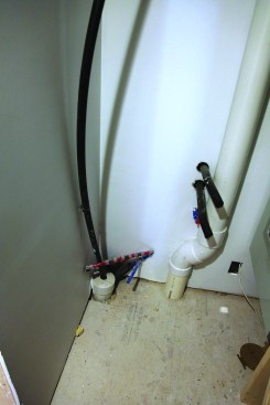 Water pipe enters the main house through a corner in the equipment room.