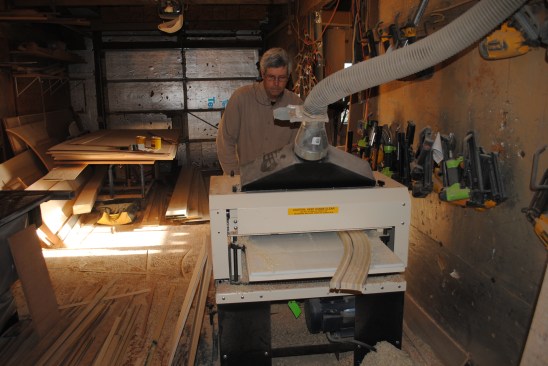 This time the author planes the blanks for the curved rail and the panel molding with a Woodmaster Planer/Molder to clean them up.