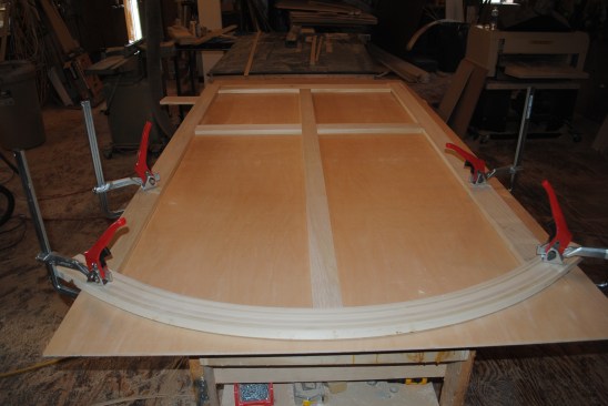 Here the stiles and rails for the back panel have been cut and fit into place.