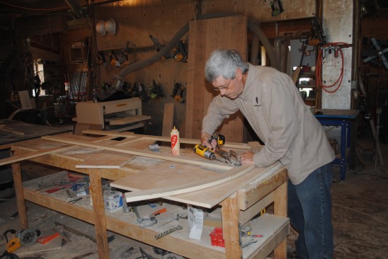 Working from the back side, pocket screws and glue connect the frame pieces for the back panel. 