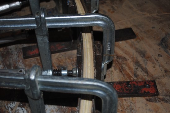 When the right amount of clamping pressure has been applied, glue should ooze from the seams between the strips.