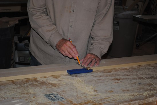 He then transfers the rail positions to the second stile.