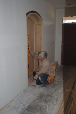 He then plumbs the assembly and shims it in place much like a prehung door frame. 