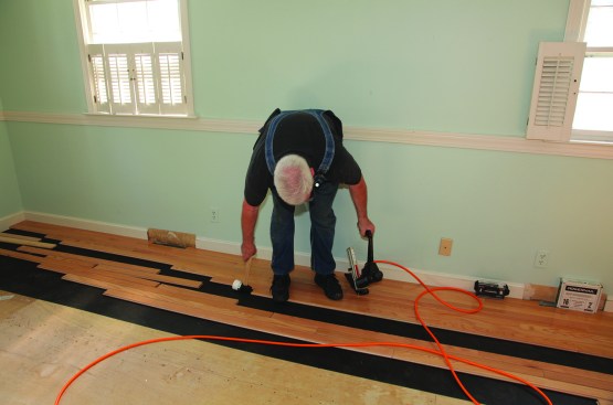 A tap on the end closes any gap between the boards and it's ready to be nailed