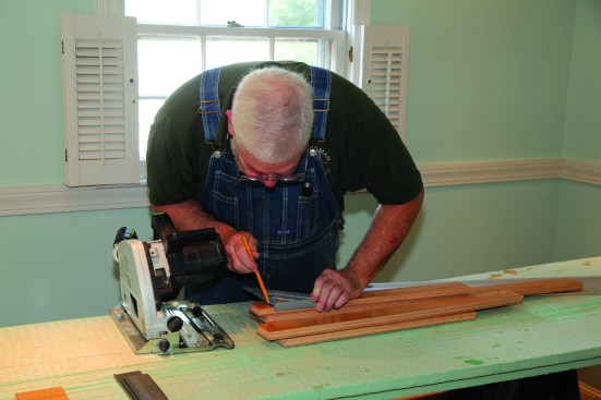 Lines are squared across the boards at the length marks.