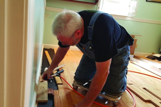 A jig made from scrap scribes the final board.