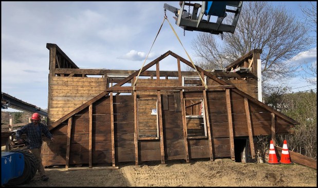 The north gable-end wall assembly was removed in one piece (photo, above) and later disassembled on the ground, its components were individually tagged and documented.