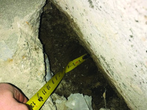 In their investigation, the crew discovered that there was no footing under the original foundation and turned to an engineer for a solution.