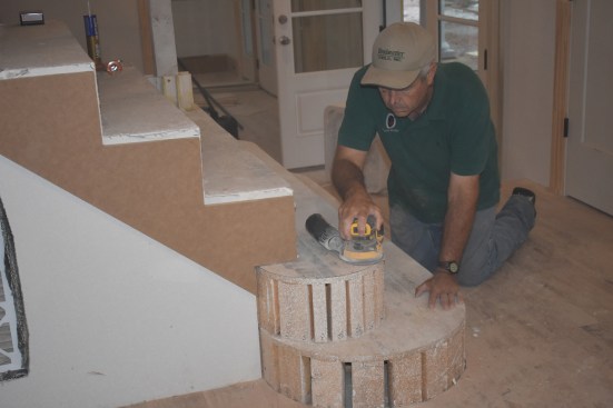 The author sanded the rough treads to prepare them for installation. 