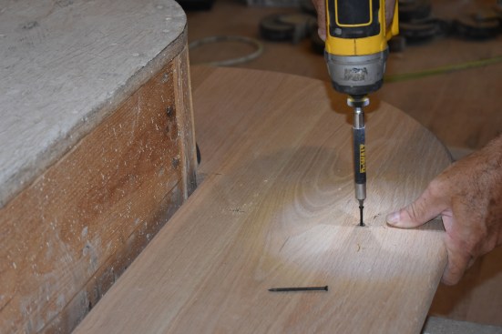 Because of their narrow minimally invasive heads, the author drove finish screws to hold the treads in place until the adhesive had a chance to cure.