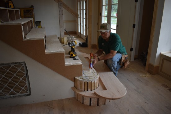 As with the bottom starter step, the author applied a liberal amount of adhesive to the rough tread of the upper step.