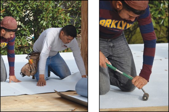 The roofing crew applies peel-and-stick underlayment to the plywood roof deck (above left), rolling the material under pressure to create a good bond (above right).