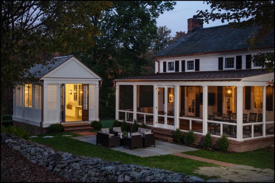 A free-standing outdoor kitchen (shown on the left) is the crown jewel of the outdoor living project.