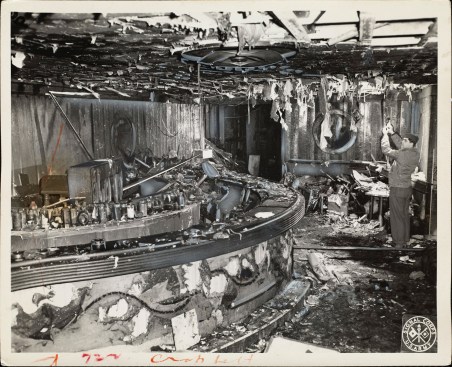 Army personnel help document the fire damage in the new cocktail lounge on Broadway. The Broadway lounge had opened only 11 days earlier, and planned fire doors separating the lounge from the rest of the club were not installed. See plans, below.