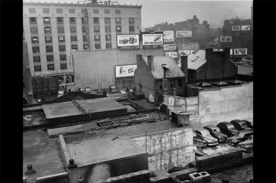 The “rolling” roof, seen here in the middle of photo behind the damaged roof, is partially open.