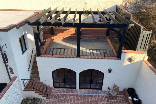 The completed upper patio with pergola.