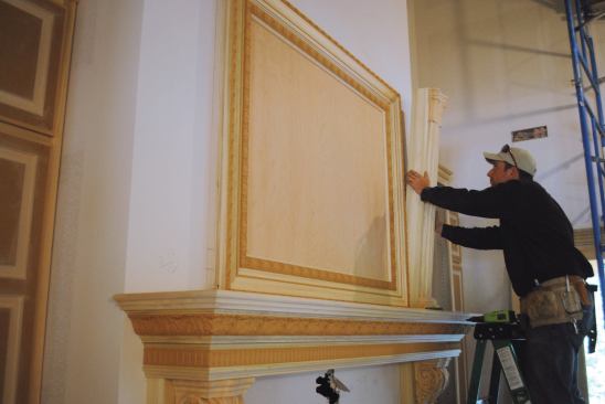 Like the pilasters below, the upper pilasters attach to a block screwed to the wall.