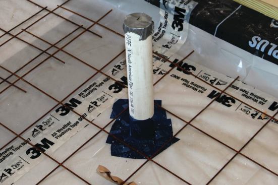 The poly sheet was taped with all-weather flashing tape to all electrical and plumbing penetrations through the slab.