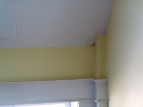 Even after roof repairs, new stains appeared.